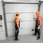 Bulldog Garage Door Repair technician installing a garage door.