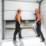 An image showcases an insulated garage door, symbolizing comfort and energy efficiency. The sturdy construction and insulation material highlight the door's ability to go beyond temperature control, offering durability and sound reduction. Recommended by Bulldog Garage Door Repair in Dallas, TX, for a more resilient and quieter living space.